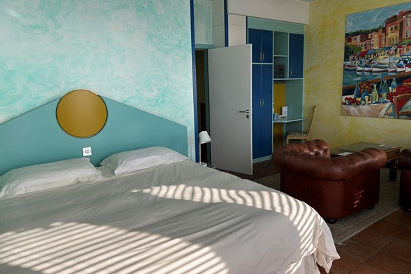 An image labelled Suite with Sea View Room