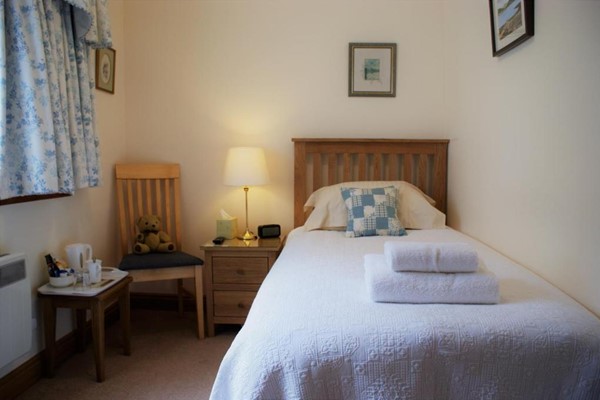 An image labelled Single Room With Private Bathroom