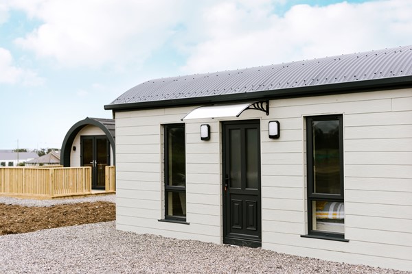 An image labelled No. 1 Family Glamping Pod