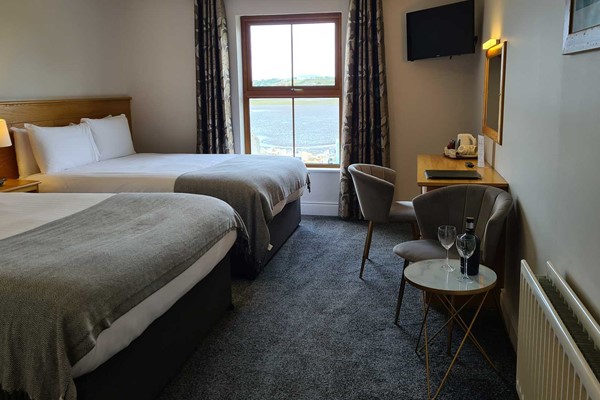An image labelled King 2 x Doubles (Bay Views) Room
