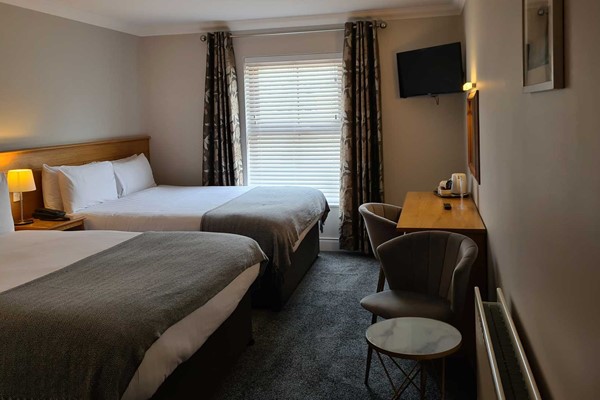 An image labelled King 2 x Doubles (No Bay Views) Room