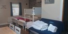 An image labelled 2 x single beds and 1 x pull out bed. 1 x bunk bed. With private Jacuzzi :)