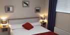 An image labelled Ground Floor(404) - Sleeps 2, King bed. Comes with private 