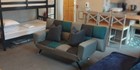 An image labelled Upstairs 2 bedroom apt. sleeps 6 (Apt. 303).