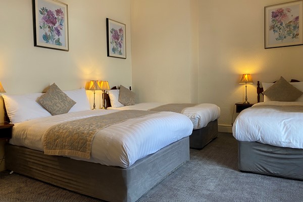 An image labelled Quad Room