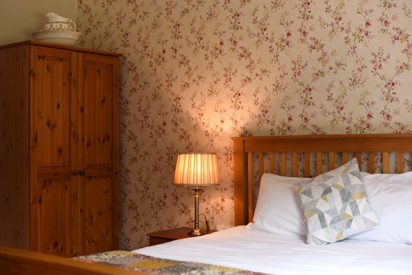 An image labelled 2 Doubles - 1 Singles Standard Room