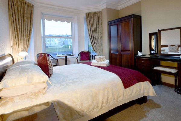 An image labelled Deluxe Double Room