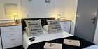 An image labelled Nos chambres standard 14 m² tout confort 