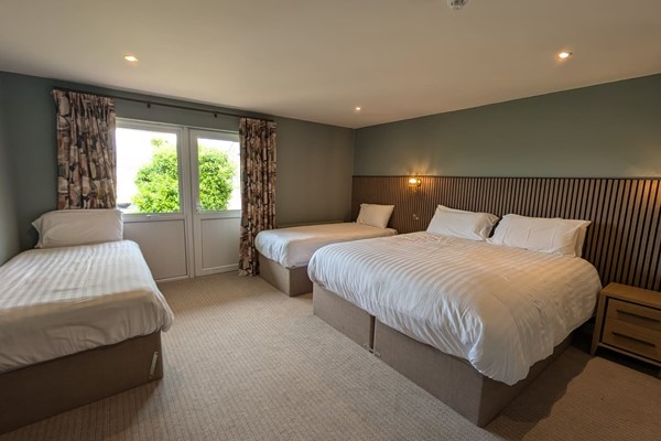 An image labelled Triple Room