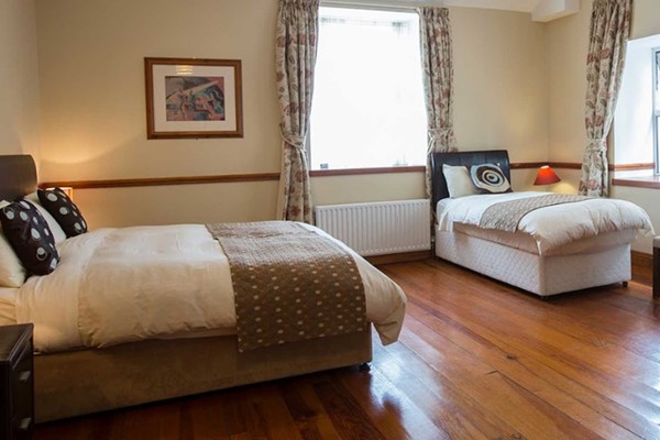 An image labelled Triple Room