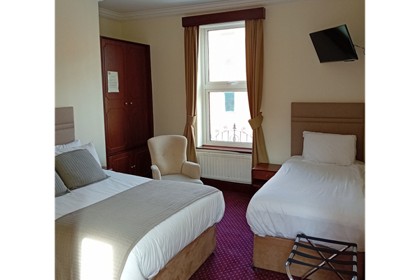 An image labelled Triple Room