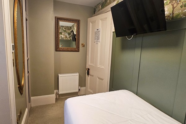 An image labelled Economy Single Ensuite Room