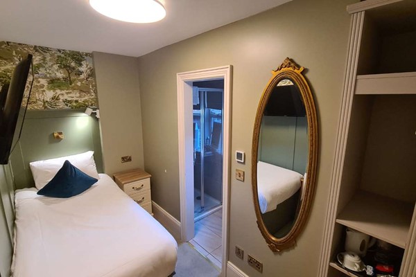 An image labelled Economy Single Ensuite Room