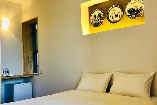 An image labelled Twin Double with Garden View Room