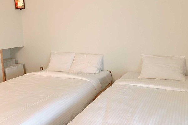 An image labelled Triple Loft Room
