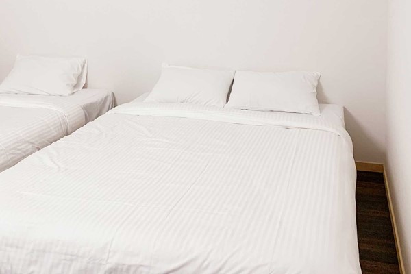 An image labelled Standard Triple Room