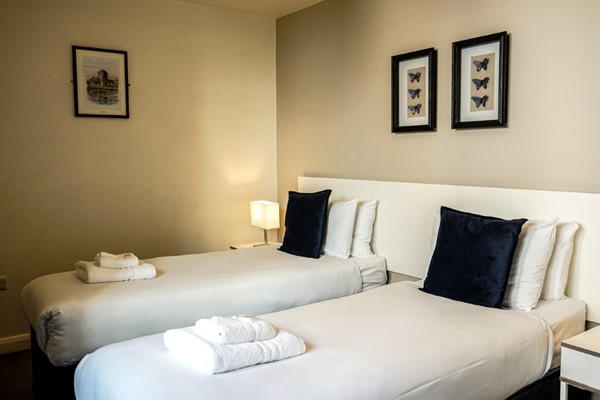 An image labelled 2 Singles Apartment