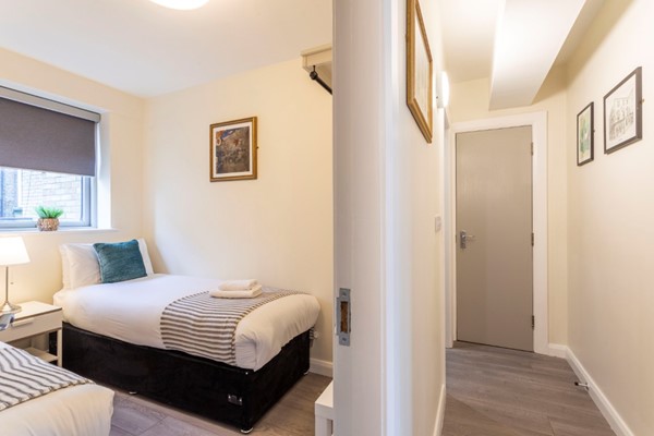 An image labelled Quad Apartment