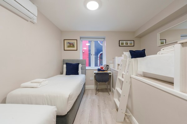 An image labelled Triple Room