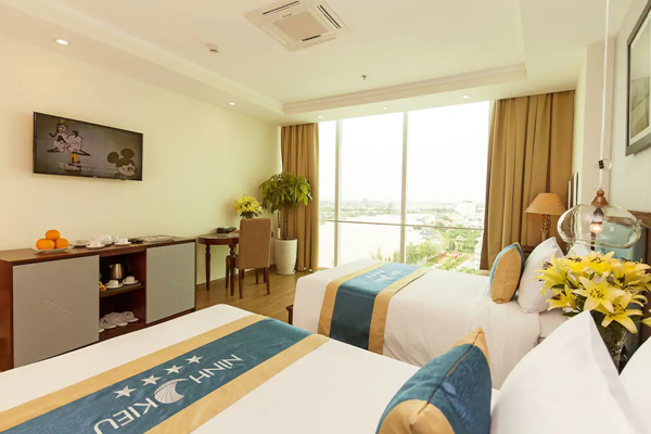 An image labelled Executive Deluxe River View Twin Room