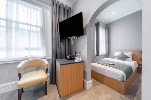 An image labelled Triple Room