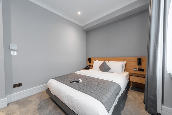 An image labelled Quad Room