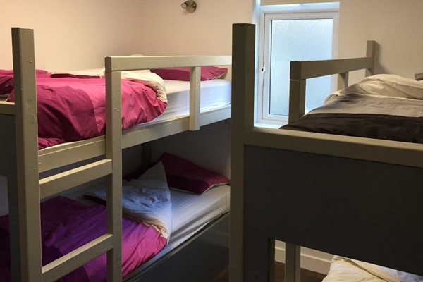 An image labelled Quad Room