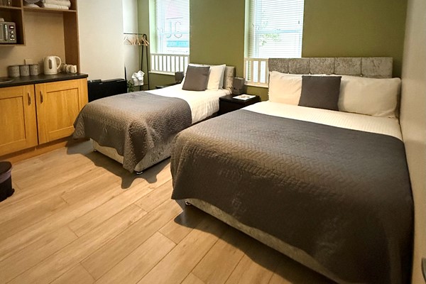 An image labelled Family (Double & Single) Room