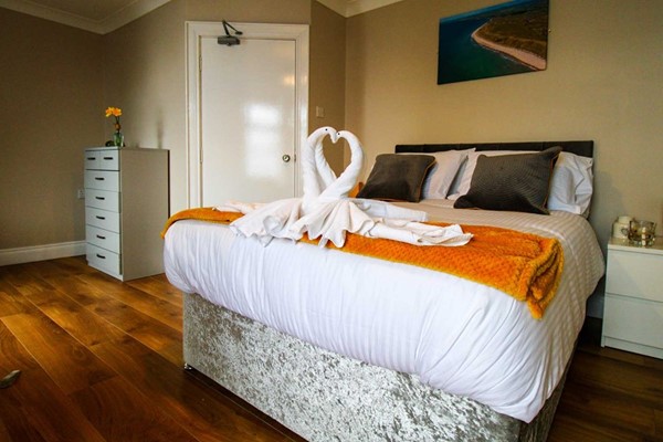 An image labelled Deluxe Double Room