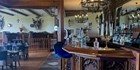 An image labelled Welcome to the Hedges Restraunt - Where flavour meets elegance  