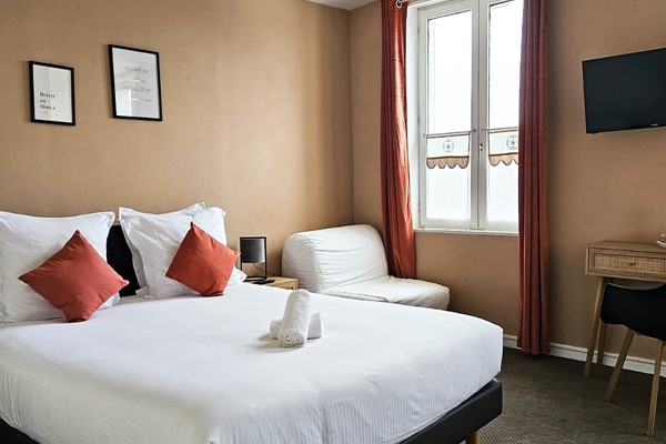 An image labelled Chambre Confort (option triple)