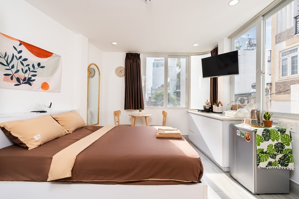 An image labelled  Deluxe Queen Room