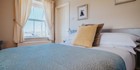 An image labelled A Warm Welcome Awaits