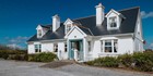 An image labelled Móinéir House