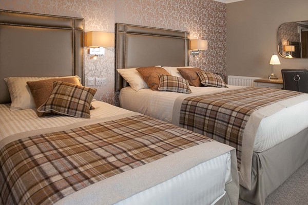An image labelled Deluxe Family Room