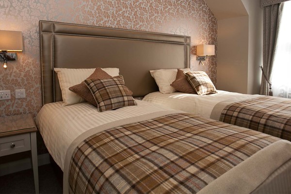 An image labelled Deluxe Twin Room