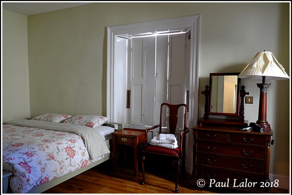 An image labelled Deluxe Double/Twin Private Ensuite Room