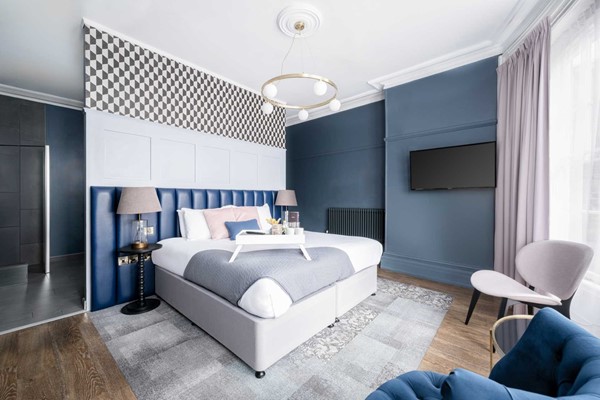An image labelled Deluxe Double Room