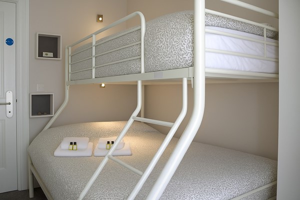 An image labelled Double & Single Bunk  Room