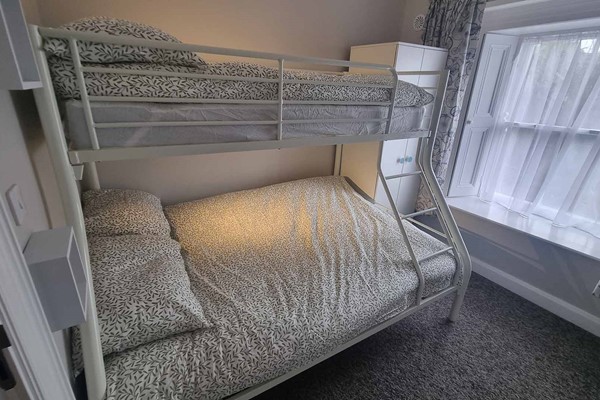 An image labelled Double & Single Bunk  Room