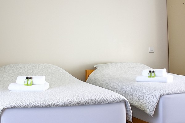 An image labelled Superior Twin Room