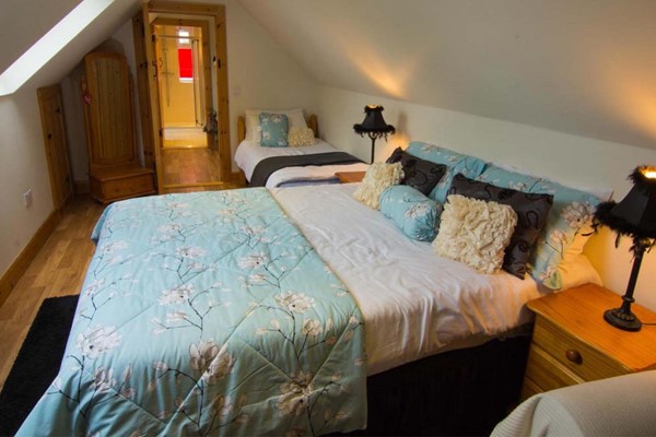 An image labelled Triple Room