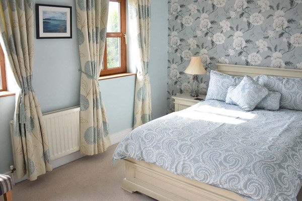 An image labelled Deluxe Double Room