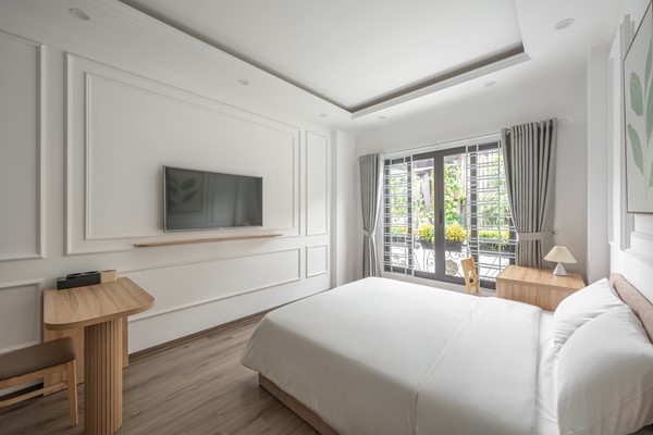 An image labelled Deluxe Suite Ngoc Ha Room