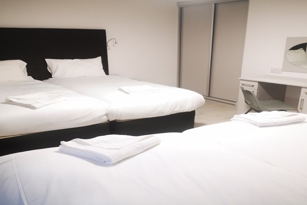An image labelled 3 Bedroom Townhouse for 10 House