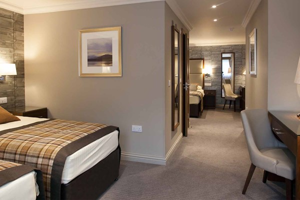 An image labelled Quad Room