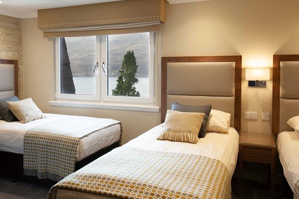 An image labelled Triple Room