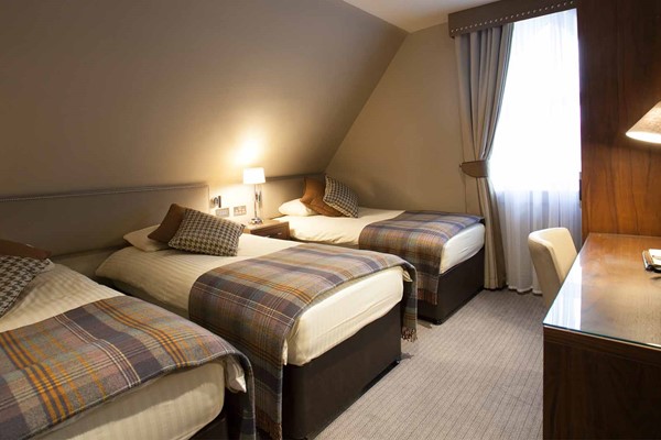 An image labelled Tower Triple Room
