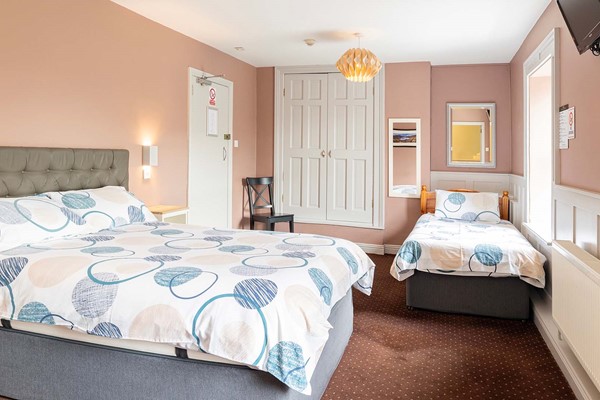An image labelled Triple Room