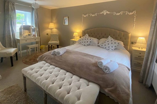 An image labelled Deluxe Double Room
